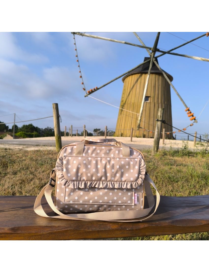 Lancheira bege com bolas brancas