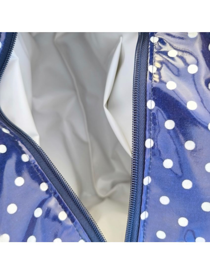 Lancheira azul com bolas brancas