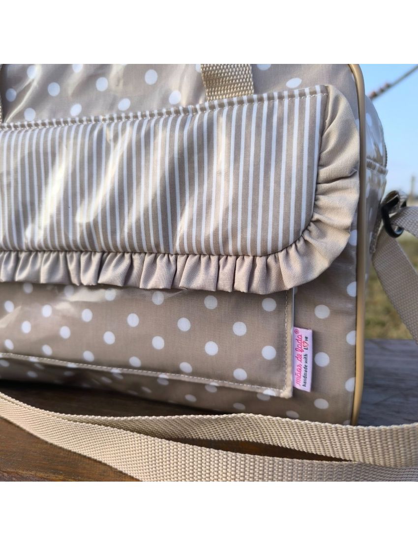 Lancheira bolas e riscas bege